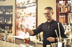  A man in the hospitality using RPA to reduce human