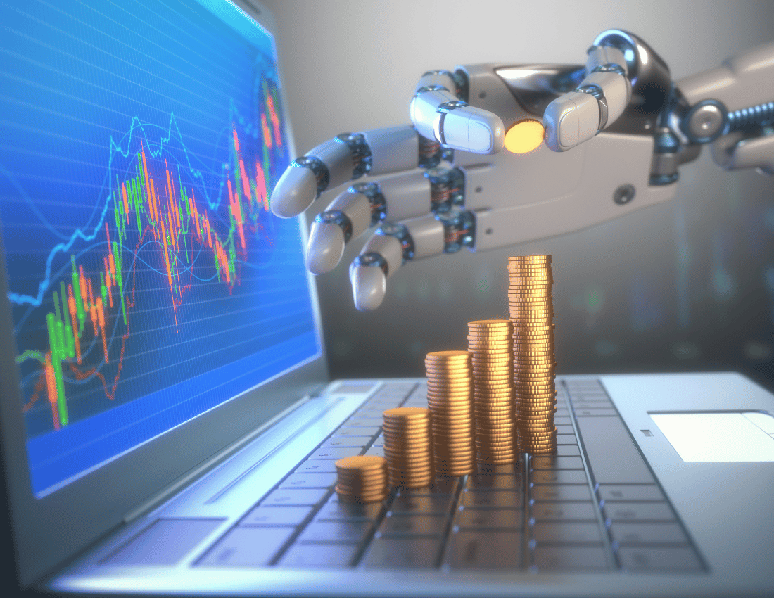 A robot hand picking up a coin in front of a laptop whilst looking at a graph that is showing upward growth showing the transformation of Robotic Process Automation from a cost centre to a revenue generator.